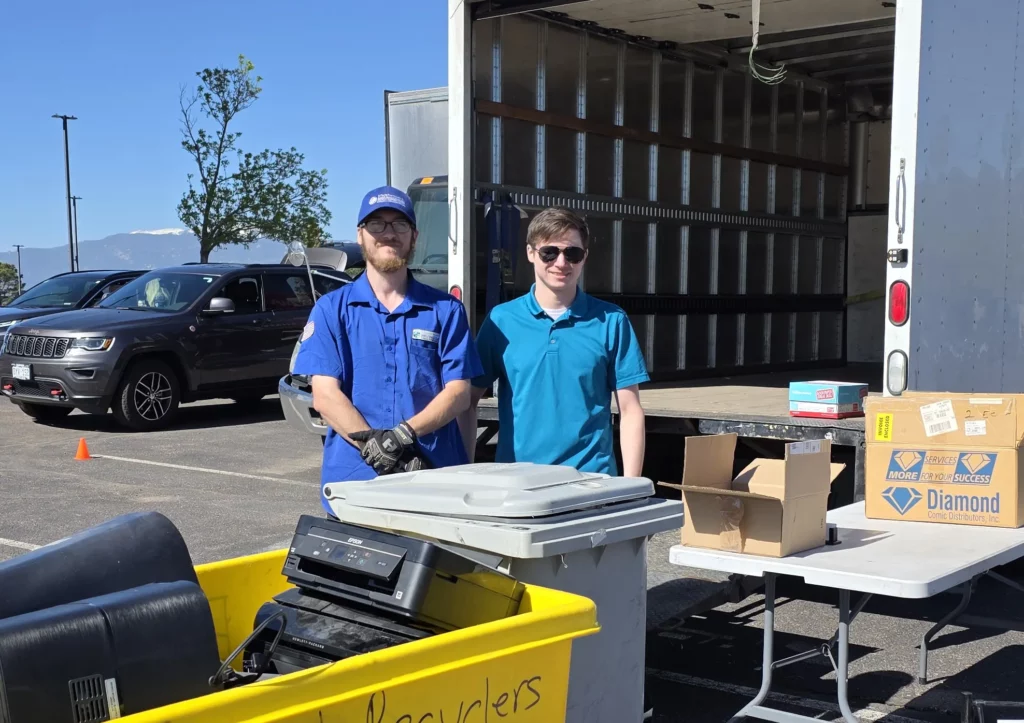 Kevin and Tyler from E-Tech Recyclers at a community electronics recycling event
